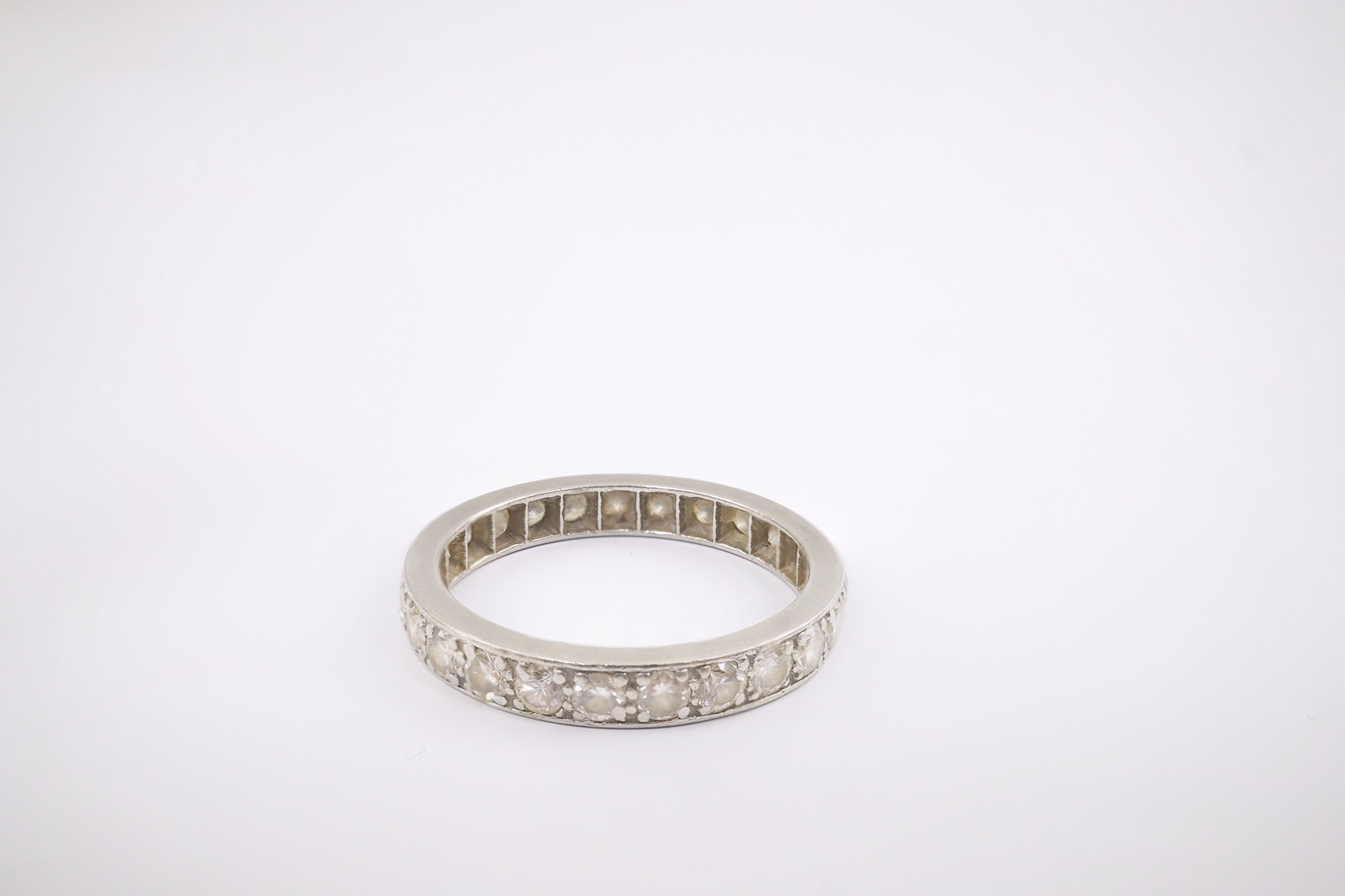 A platinum and diamond set full eternity ring